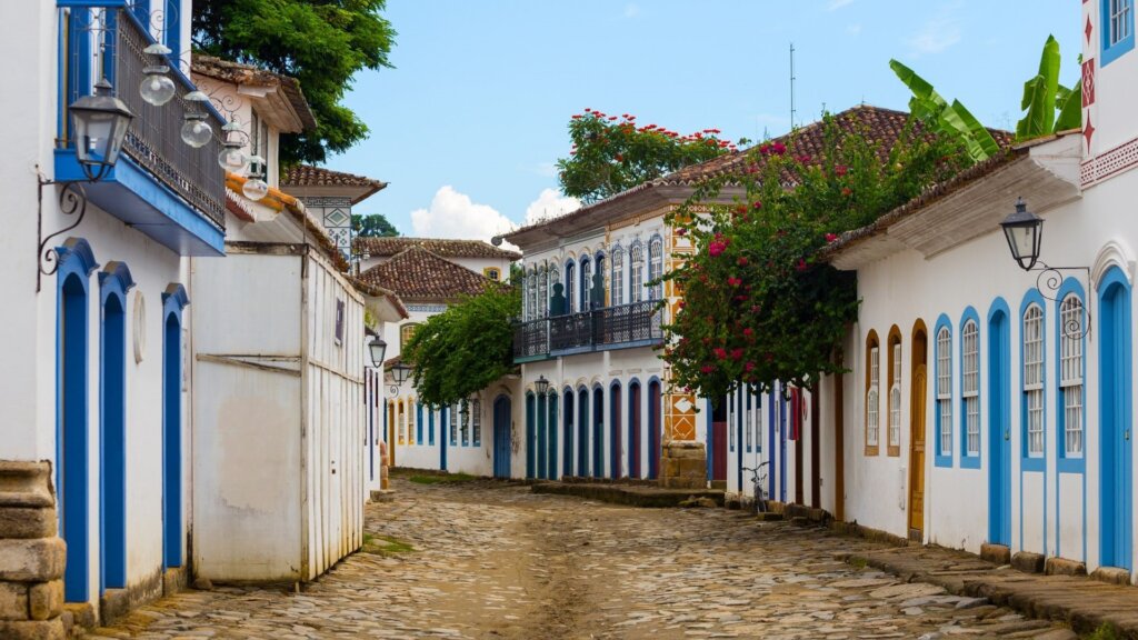 A street in Paraty, Brazil lined with white buildings